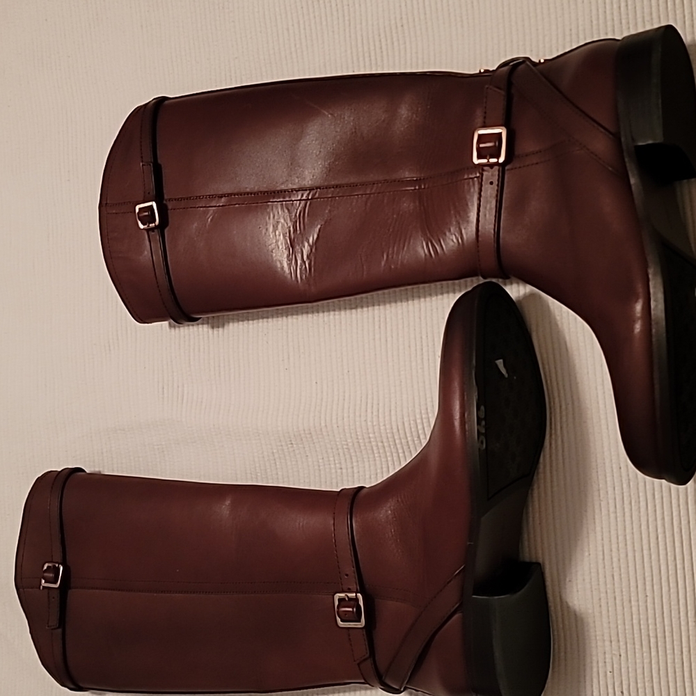 Brown knee high leather boots